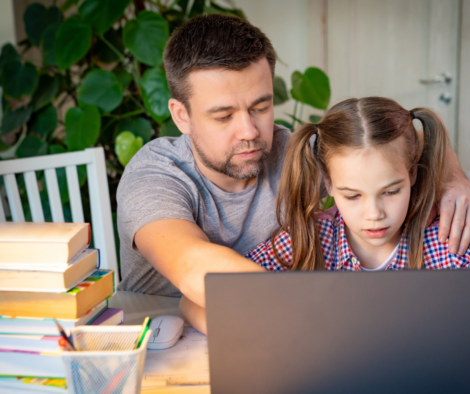 parent helping child with online school - child mental health