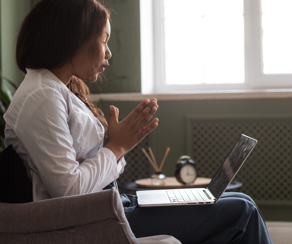 Image of a person holding a laptop displaying the integration of community mental health and technology with ARMHS (Assertive Community Treatment Health Services), Minnesota mental health clinics, ccbhc Minnesota