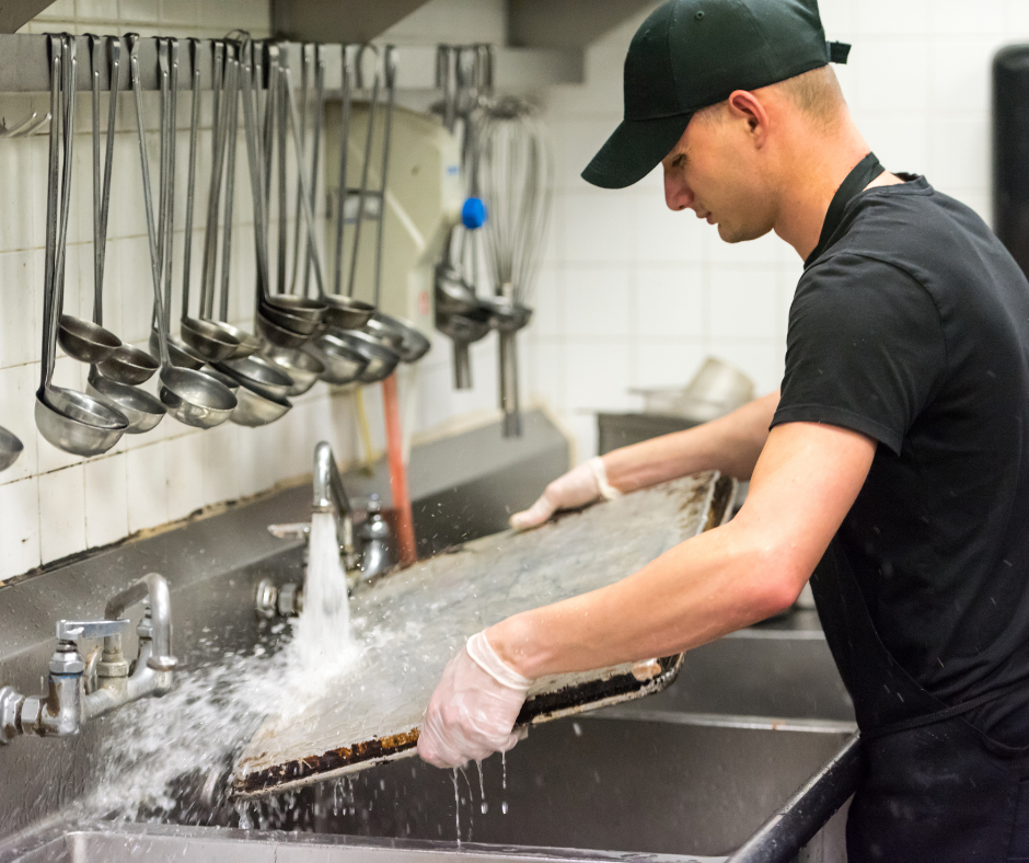 Guy washing dishes